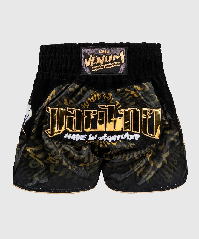 Men's breathable cotton athletic shorts for intense workoutsShort de Muay Thai Venum Attack - Noir/Or