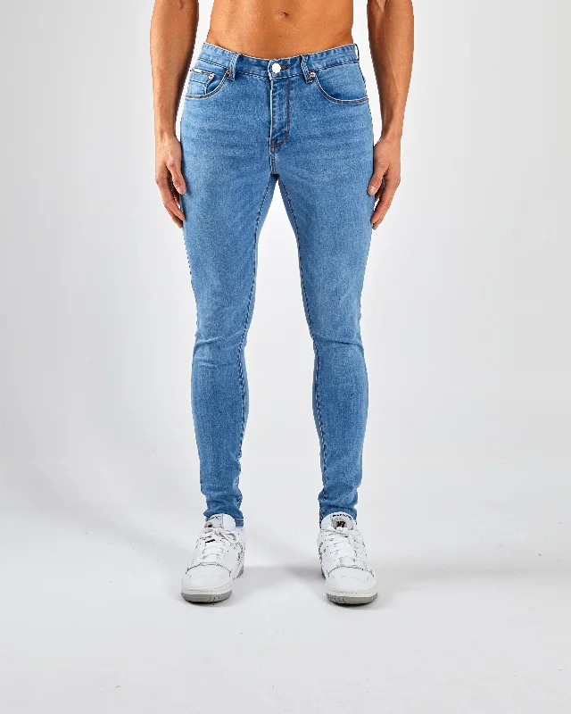 Men's Jeans with a Frayed Hem for a Casual and Effortless StyleSaxon Skinny Blue Fade