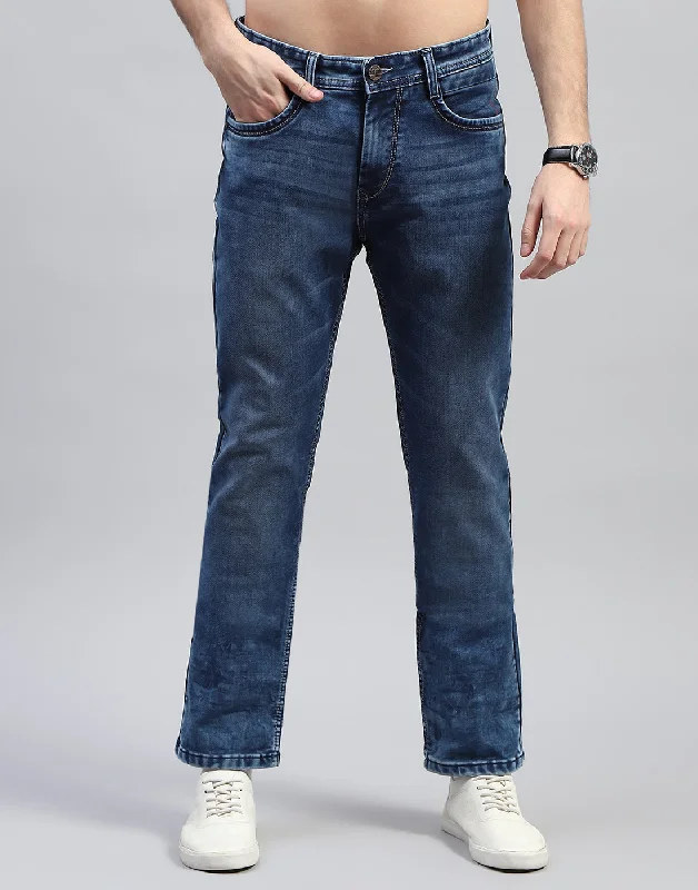 Men's Jeans with a Frayed Hem for a Casual and Effortless StyleMen Blue Solid Straight Fit Denim