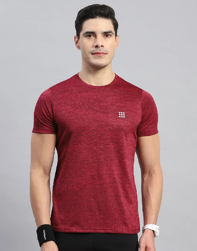 Men's long - sleeve henley t - shirts with button - down placketsMen's long - sleeve henley t - shirts with button - down placketsMen Maroon Self Design Round Neck Half Sleeve T-Shirt